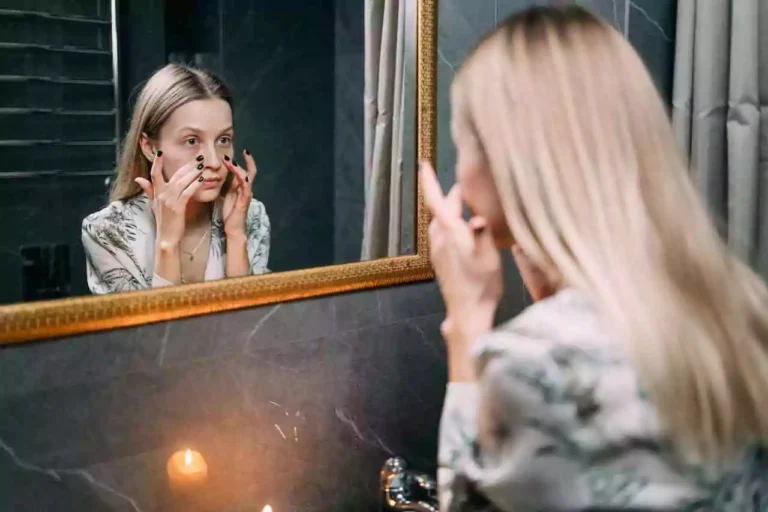 The Pendulum Rule: a woman looking at herself in the mirror