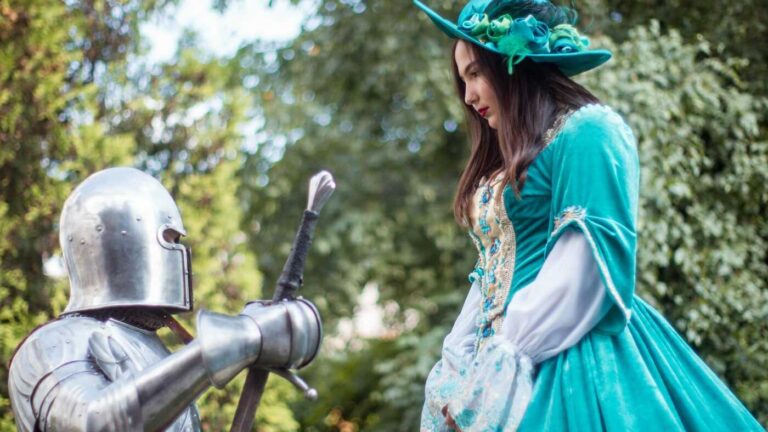 Honor Code: A knight in full armor kneeling and offering a sword to a woman dressed in an elegant, teal medieval gown.