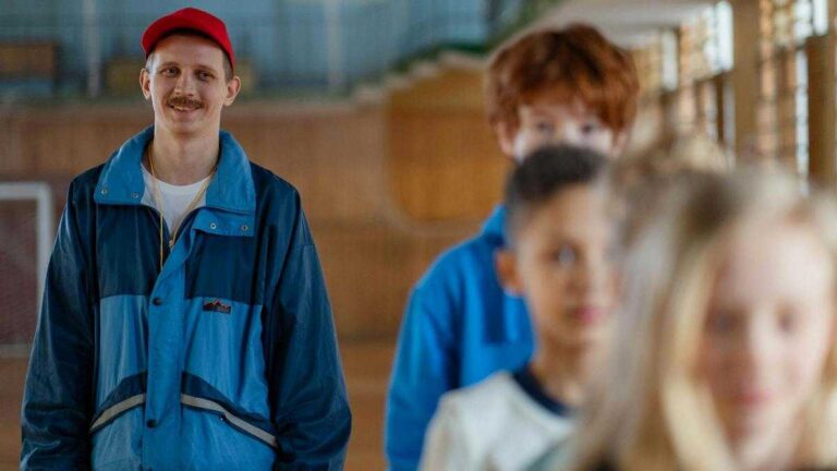 How to wisely praise a child: A teacher looks at a group of students.