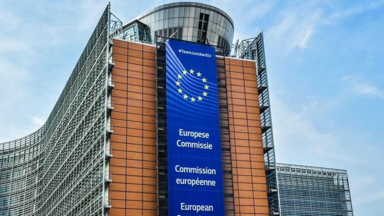 AI Act: European Commission headquarters in Brussels with a banner