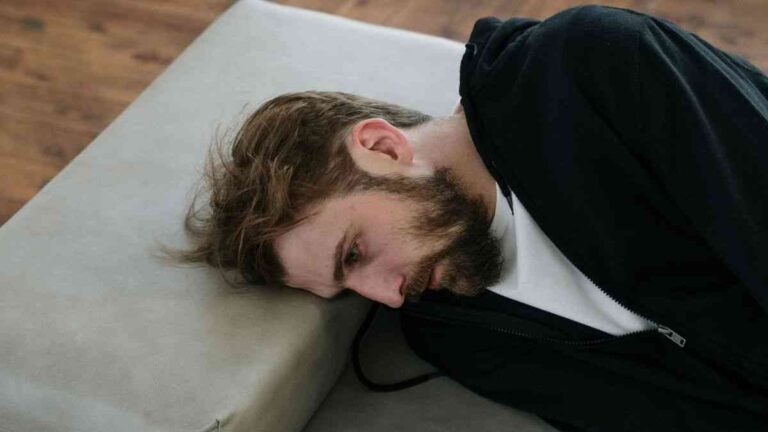 How PTSD develops: A man on a therapist's couch. Photo by cottonbro studio / Pexels