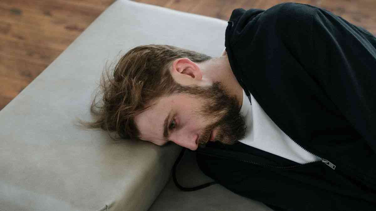 How PTSD develops: A man on a therapist's couch. Photo by cottonbro studio / Pexels