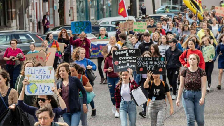 Climate activists are protesting in the street.