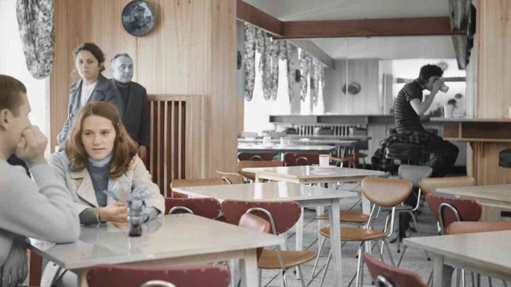 Daily life in the former Eastern Bloc – a bar with customers at their tables, memories of the former communist era, and cigarettes in the 1990s.