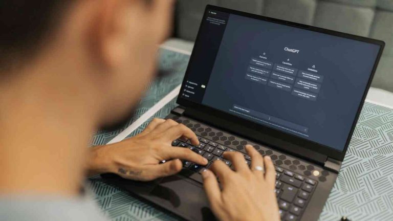 AI political views under scrutiny. Is artificial intelligence left-wing? Pictured: a man sitting at a computer