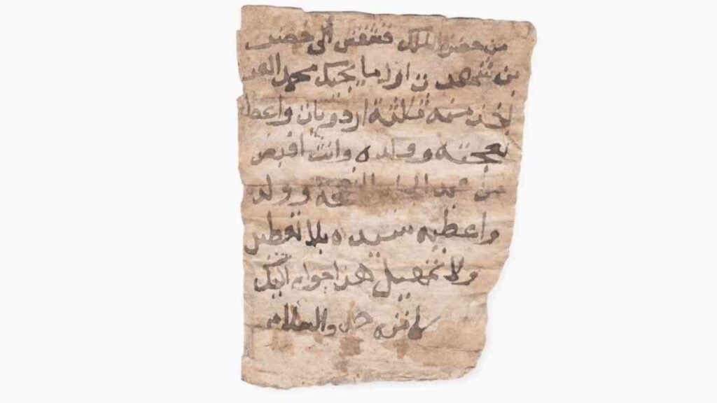 An old sheet of paper with Arabic writing on a white background.