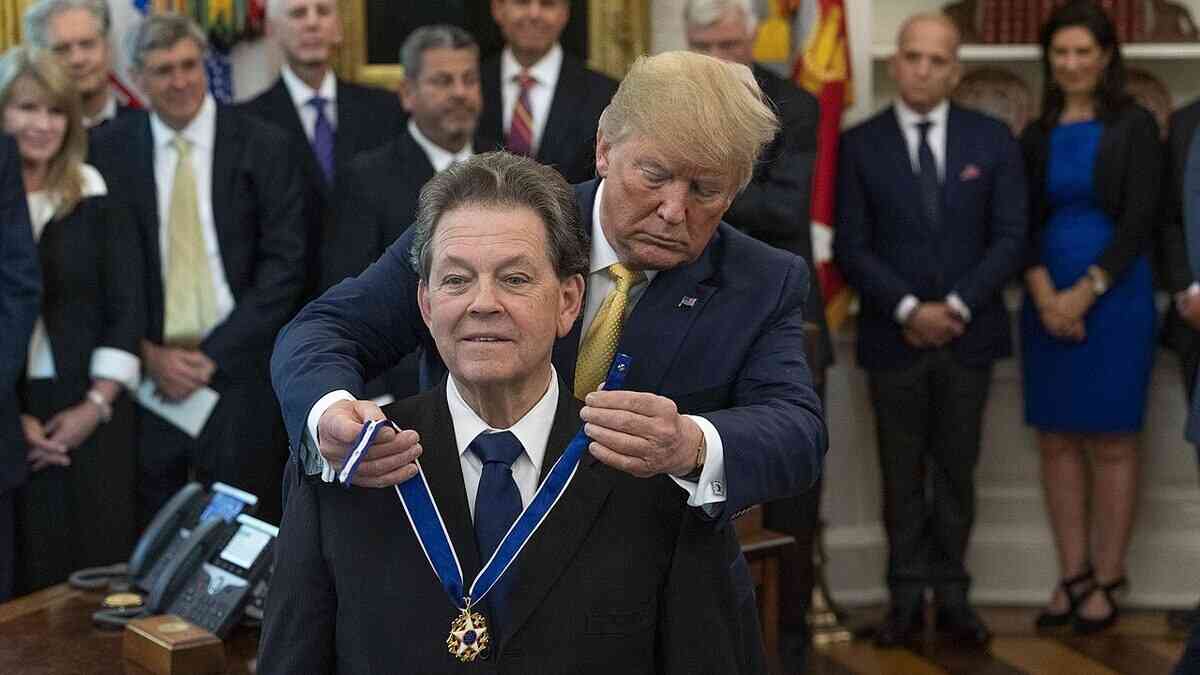 Famous economist Arthur Laffer warns that the tax burden in Europe is too high. Pictured: President Trump presents Laffer with the Medal of Freedom.
