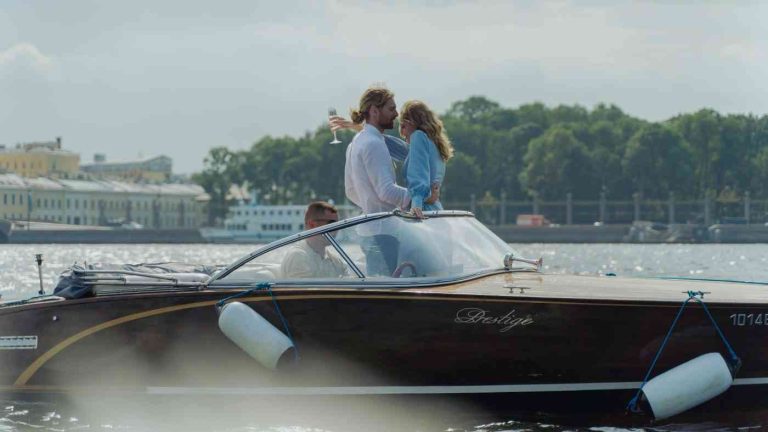 A man and a woman on a boat mask their fear of rejection