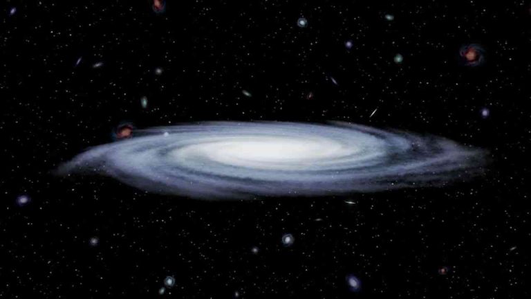 A luminous white circle contrasted against a deep black cosmic background scattered with stars, illustrating the structural formation of a black hole.