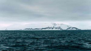 Water and an iceberg, showing a contrast to the global warming of the Atlantic.