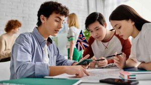 Young people working over a map capture the heart of the article well: the war for talent is less and less about abstract labor markets and more and more about real people who may leave for places offering better pay, a more stable state, and greater opportunities for growth. For countries losing young specialists, the emigration of young people is becoming one of the costs of an ageing society.