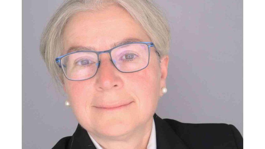 Close-up of Sharon Levy’s face against a grey background as she discusses substance use among teenagers.