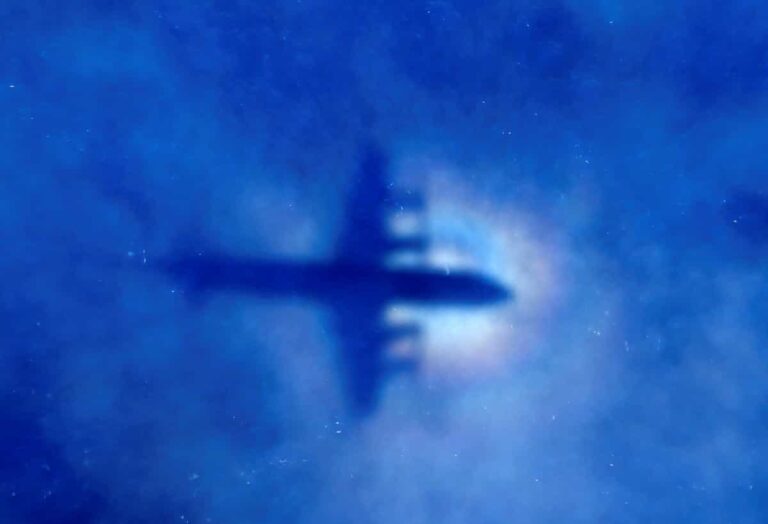 FILE PHOTO: The shadow of a Royal New Zealand Air Force (RNZAF) P3 Orion maritime search aircraft can be seen on low-level clouds as it flies over the southern Indian Ocean looking for missing Malaysian Airlines flight MH370 March 31