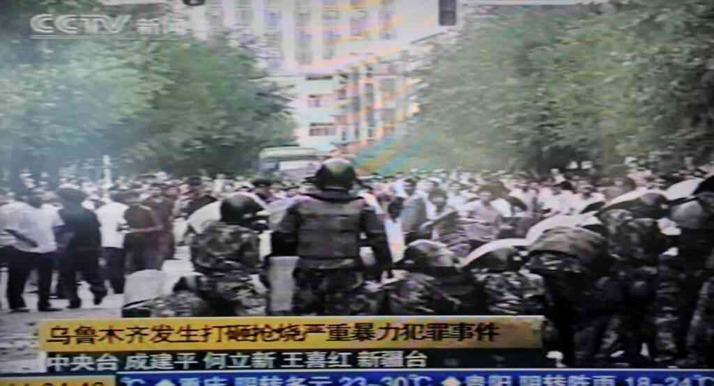 PHOTO: AFP/EAST NEWS A frame grab of a television screen created on July 6, 2009 shows a broadcast by China Central Television (CCTV) in which a crowd clash with security forces on a street in Urumqi, the capital of China's Autonomous Region of Xinjiang on July 5, 2009. The televised report said the violence was orchestrated by Rebiya Kadeer, head of the World Uighur Congress, who now lives in exile in the United States. But an emailed statement from exiled Uighurs citing Kadeer disputed the official version of events, saying that Chinese security forces had over-reacted in quelling peaceful protests by Uighur students. The report added that calm had now been restored to the city, which is home to about eight million Uighurs.      CHINA OUT        RESTRICTED TO EDITORIAL USE        AFP PHOTO/CCTV