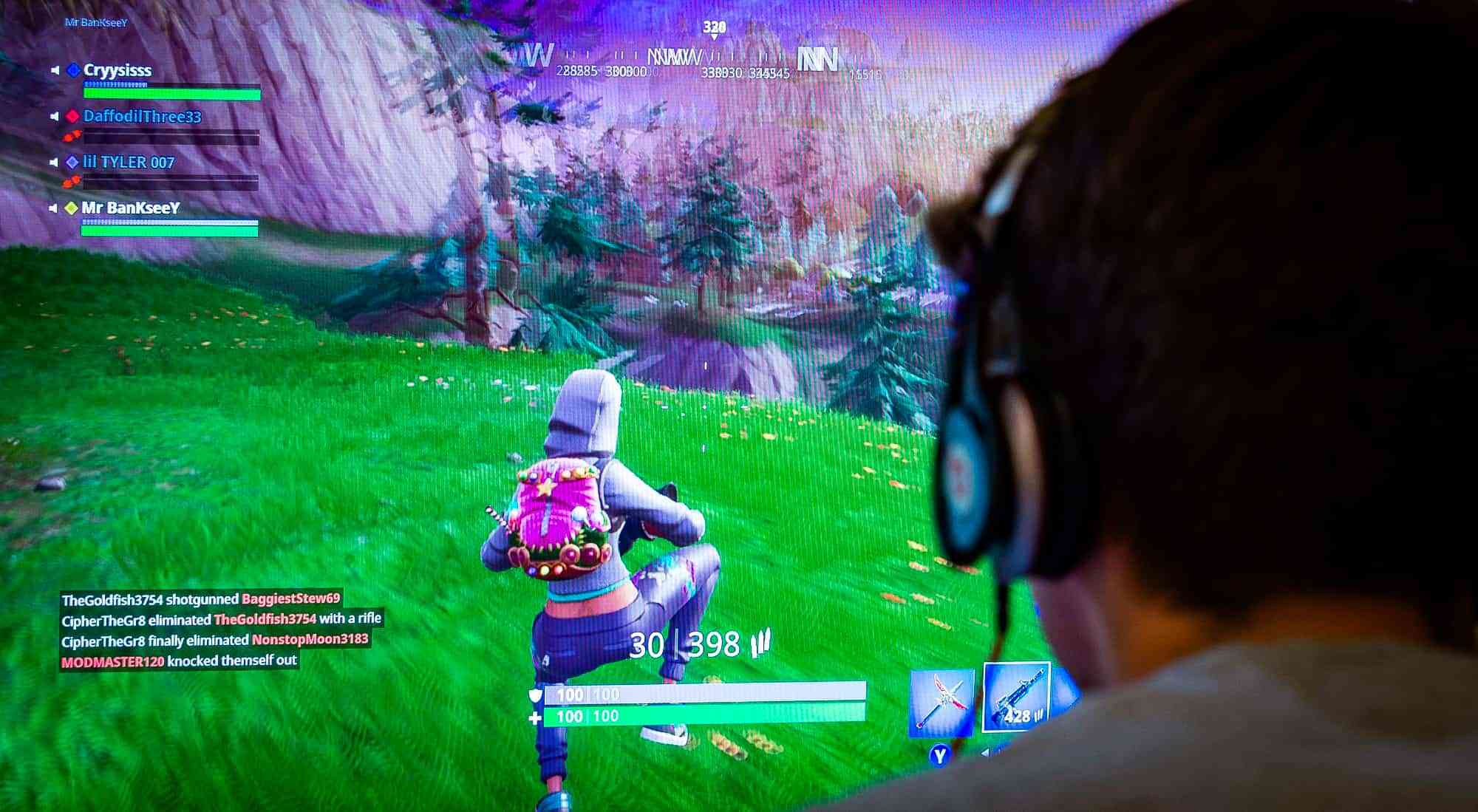 Mandatory Credit: Photo by Steve Meddle/REX/Shutterstock (9722617c) Teenager playing Fortnite video game