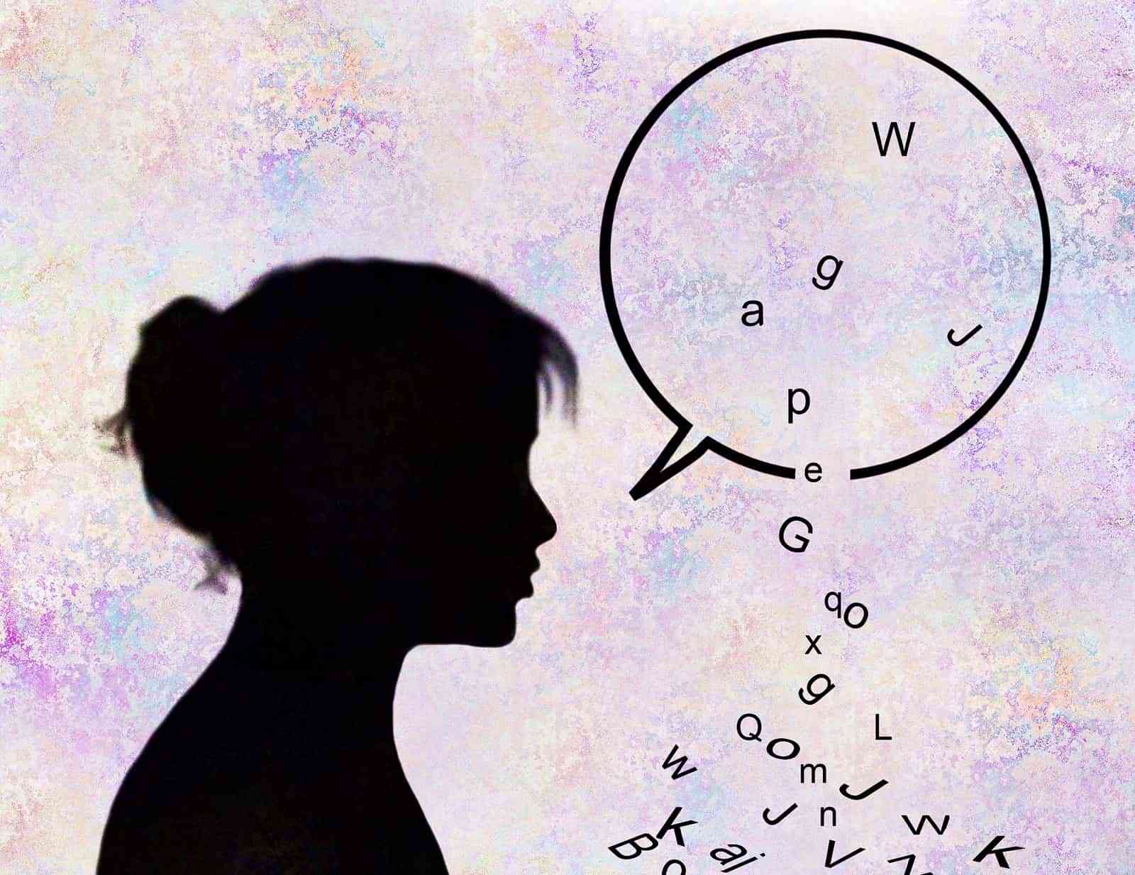 Letters falling from woman's speech bubble